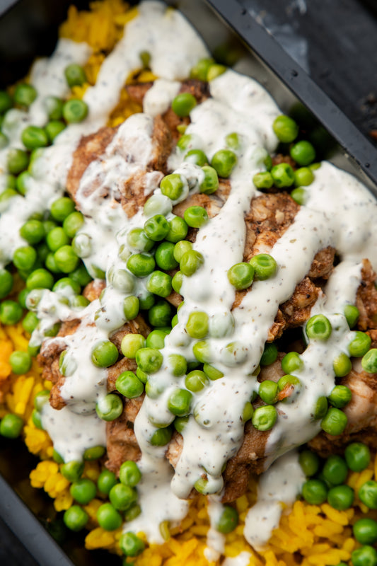 12. Jerk Chicken, Mexican Spicy Rice, Garden Peas, Tzatziki Sauce