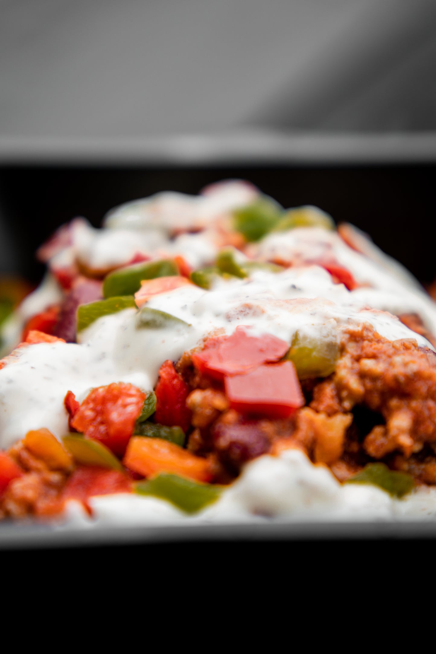 6. Beef Chill-Con-Carne, White Potato, Mixed Peppers, Tzatziki Sauce